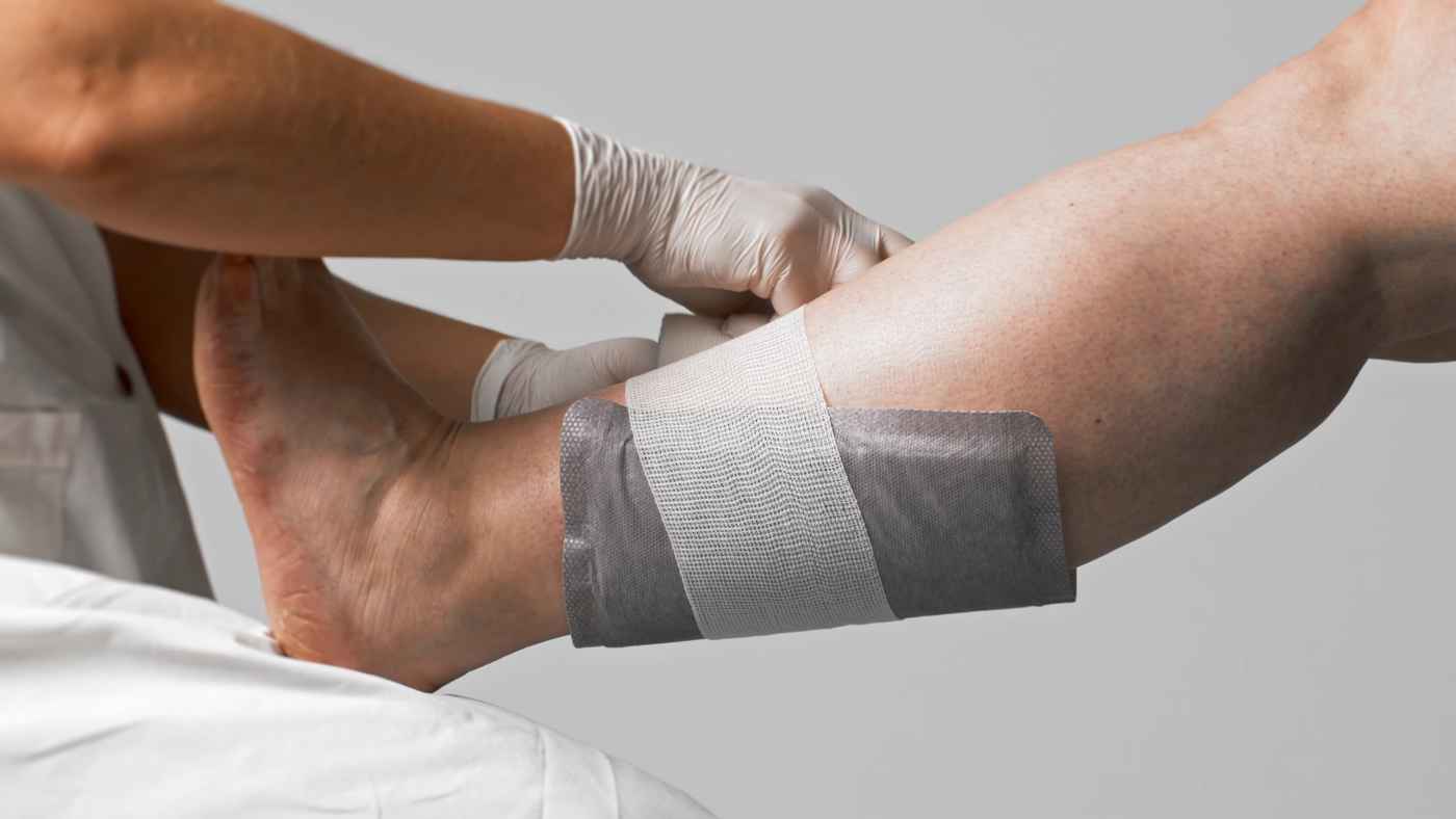 Fixation à la jambe